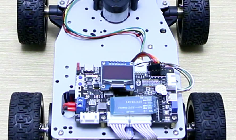 Four-wheel robot car with a spinning lidar and a custom control board