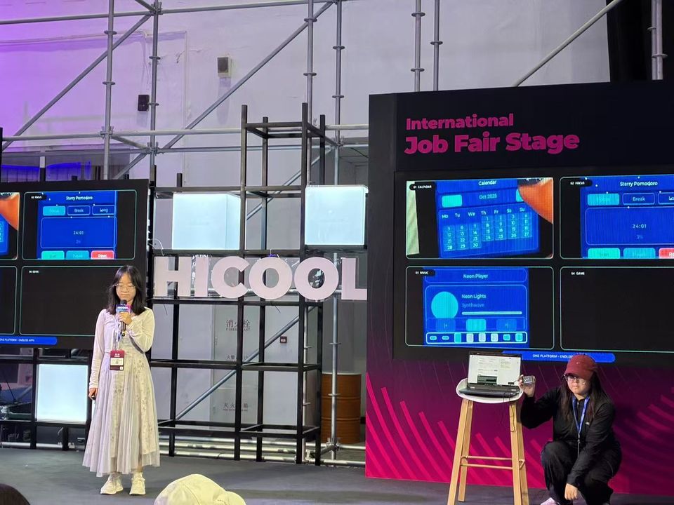 Our team presenting Blockless on the HICOOL 2026 stage, app screens on the wall behind