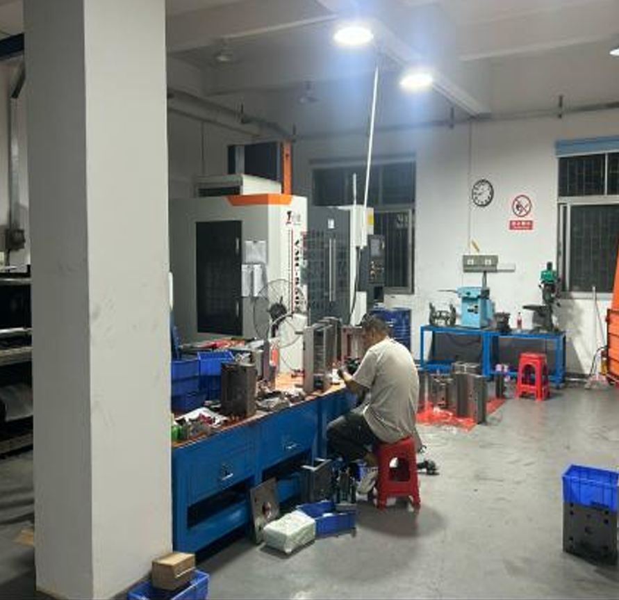 Technician fitting prototype parts