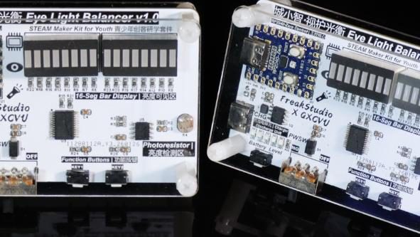 Two kit boards with 16-segment light bars and a photoresistor