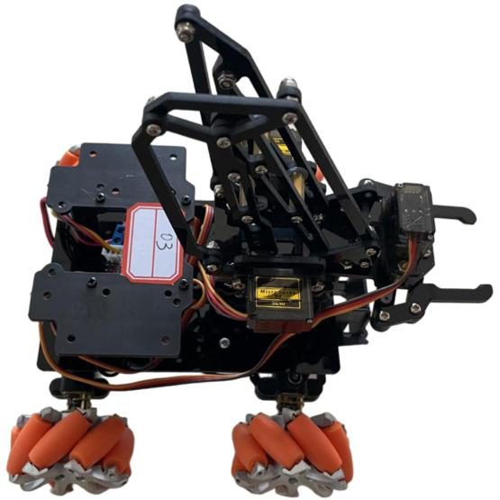 Side view of a black robot car with orange mecanum wheels and a servo-driven gripper arm, a handwritten '03' label on its side, on white