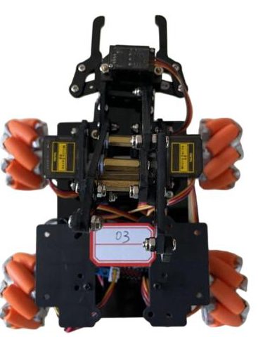 Front view of the robot car showing the gripper arm, its servos and four orange mecanum wheels, on white
