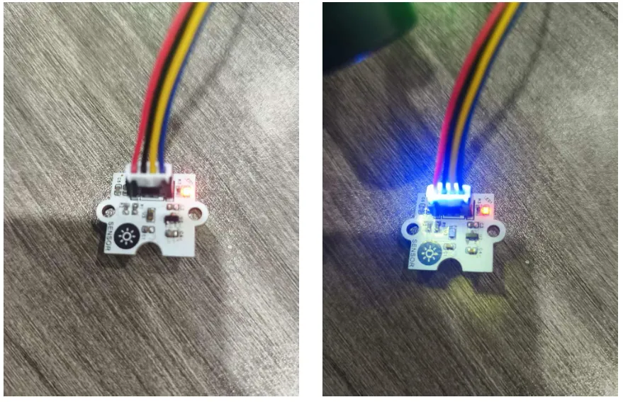 The VEML6075 module on its cable, first unlit and then under a lamp with a blue glow